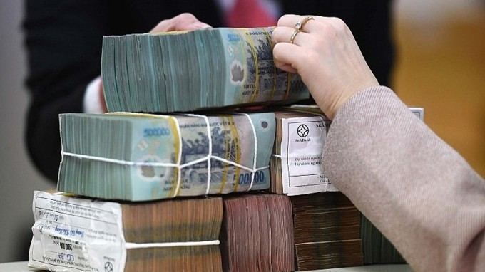 Tiền gửi dân cư lập kỷ lục gần 7,75 triệu tỷ đồng