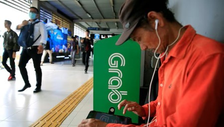 Grab, GoTo hạ mức chiết khấu từ 20% xuống 8% tại Indonesia