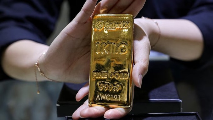 Giá vàng lên 4.200 USD/ounce